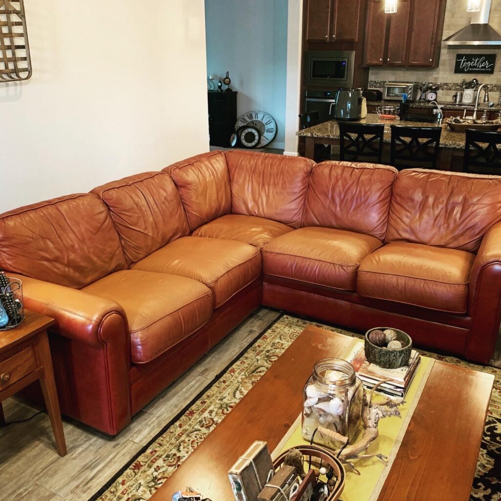 leather couch before repairs
